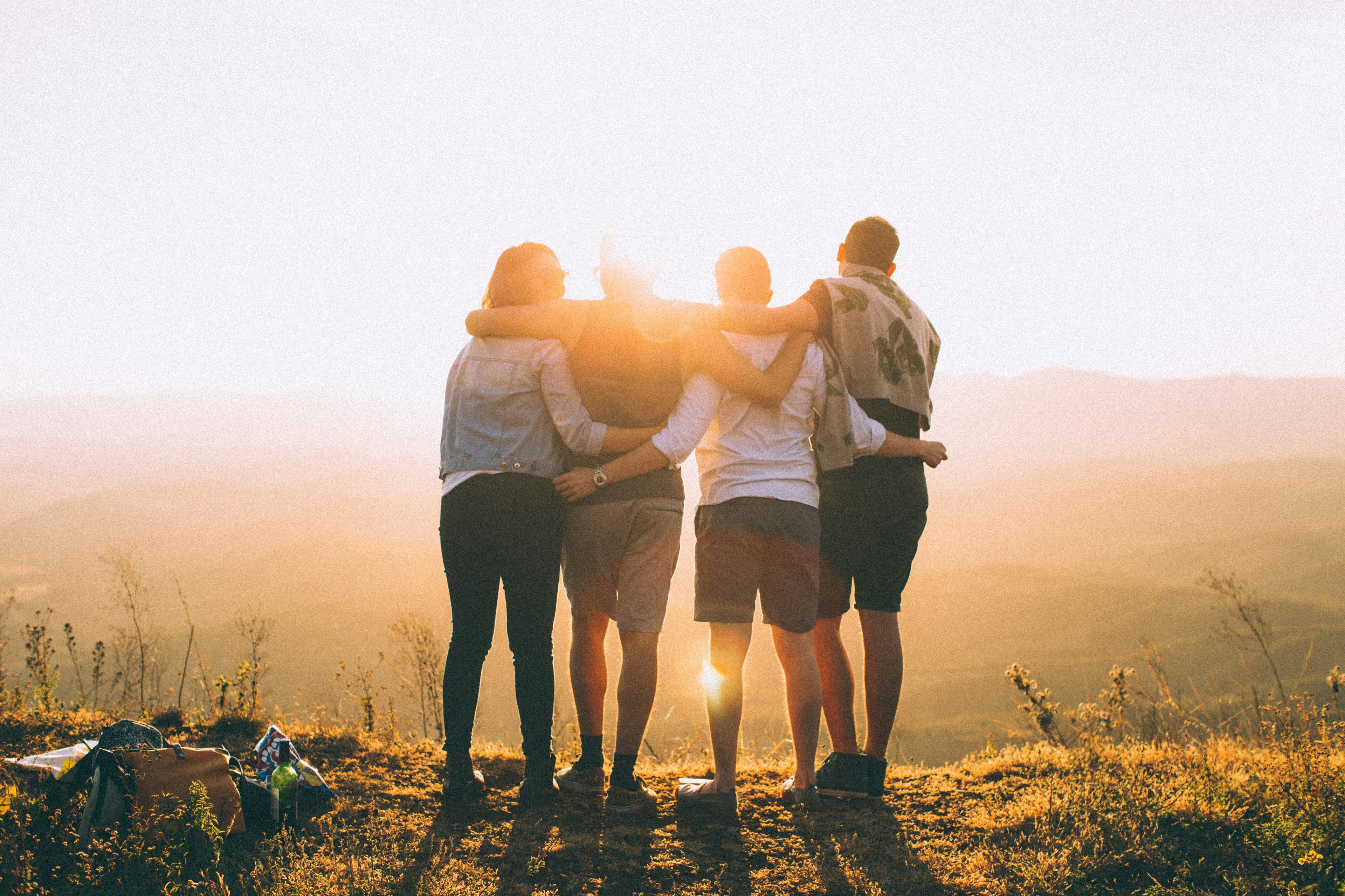 Friends smiling during a road trip